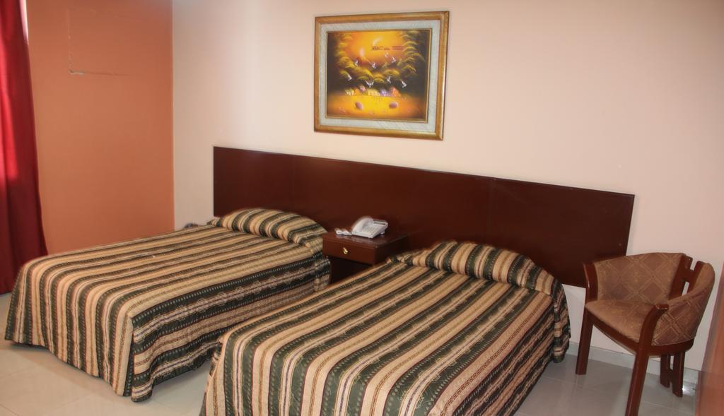 جواياكيل Hotel La Torre الغرفة الصورة